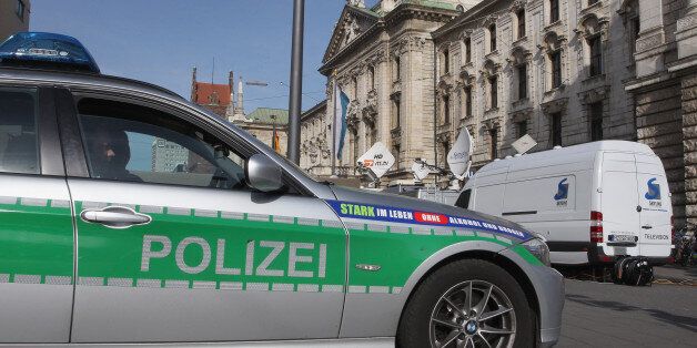 MUNICH, GERMANY - MARCH 11: A police car is pictured in front of the justice palace court house where the trial of Bayern Muenchen president Ulrich Hoeness takes place on March 11, 2014 in Munich, Germany. Hoeness is accused of tax evasion by siphoning more than 33million Euros into a Swiss bank account. (Photo by Alexandra Beier/Getty Images)