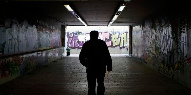 A man walks at an underground pedestrian crossing, in Athens, on Thursday, Nov. 15, 2012. Greece's economy has shrunk by 20 percent since its crisis began in 2009 and unemployment has risen to a record 25 percent. The country is expected to enter a sixth year of recession as investors pull money out of the country and the government keeps cutting spending and raising taxes to comply with the demands of its international bailout. (AP Photo/Petros Giannakouris)