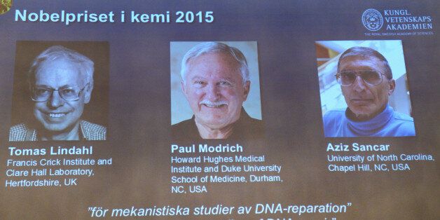 A view of the screen showing the winners of the 2015 Nobel Prize for Chemistry, during a press conference, in Stockholm, Wednesday, Oct. 7, 2015. Sweden's Tomas Lindahl, American Paul Modrich and U.S.-Turkish scientist Aziz Sancar won the Nobel Prize in chemistry on Wednesday for