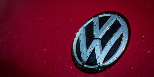 BATH, ENGLAND - OCTOBER 08: The Volkswagen logo is seen at a car dealership on October 8, 2015 in Bath, England. As the scandal surrounding Volkswagen and other motor manufacturers concerning diesel engined cars fitted with software to cheat emissions tests deepen, there have been calls for further tightening and regulation of the industry to reduce harmful emissions even further. (Photo by Matt Cardy/Getty Images)