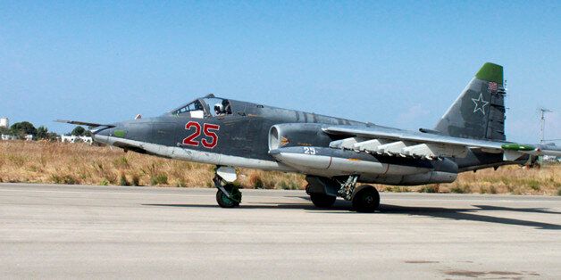 In this photo taken from Russian Defense Ministry official website on Tuesday, Oct. 6, 2015, a Russian SU-25 ground attack aircraft takes off from an airbase Hmeimim in Syria. A spokeswoman for the Russian foreign ministry has rejected claims that Russia in its airstrikes in Syria is targeting civilians or opposition forces. (AP Photo/Russian Defense Ministry Press Service)