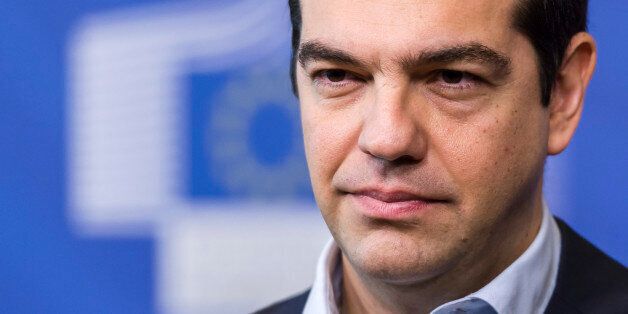 Greece's Prime Minister Alexis Tsipras addresses the media at the European Commission headquarters in Brussels Friday, March 13, 2015. (AP Photo/Geert Vanden Wijngaert)