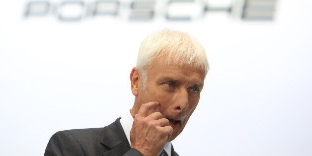 Matthias Mueller, chief executive officer of Porsche AG, reacts during a Bloomberg Television interview during previews to IAA Frankfurt Motor Show in Frankfurt, Germany, on Tuesday, Sept. 15, 2015. The Frankfurt International Motor Show starts on Thursday, and nearly one million visitors are expected to view the latest must-have vehicles and motoring technology from over 1,000 exhibitors in a space equivalent to 33 soccer fields. Photographer: Krisztian Bocsi/Bloomberg via Getty Images