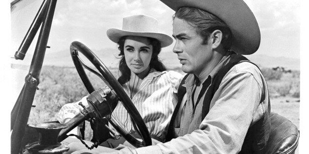 Elizabeth Taylor and James Dean in car together in a scene from the film 'Giant', 1956. (Photo by Warner Brothers/Getty Images)