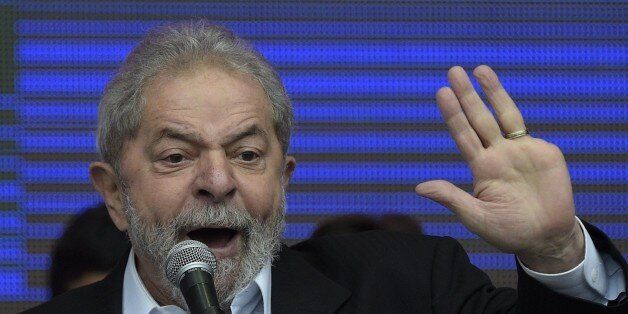 Brazilian former President (2003-2011) Luiz Inacio Lula da Silva delivers a speech in Buenos Aires outskirts on September 9, 2015, during a ceremony to inaugurate a health center based on a Brazilian model. Lula da Silva said Sunday he supports Buenos Aires governor and Argentine presidential candidate for the ruling Front For Victory (FPV) party Daniel Scioli for the upcoming October 25 general elections in Argentina. AFP PHOTO / JUAN MABROMATA (Photo credit should read JUAN MABROMATA/A