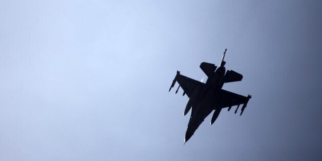 ADANA, TURKEY - AUGUST 11: A warcraft takes off from the runway at the Incirlik 10. Tank Base Command Base in Adana, Turkey on August 11, 2015. (Photo by Ibrahim Erikan/Anadolu Agency/Getty Images)