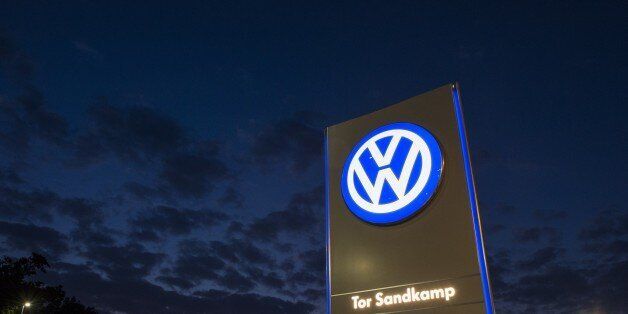 A logo of German car manufacturing giant Volkswagen is seen outside their headquarters in Wolfsburg on September 25, 2015. AFP PHOTO / JOHN MACDOUGALL (Photo credit should read JOHN MACDOUGALL/AFP/Getty Images)