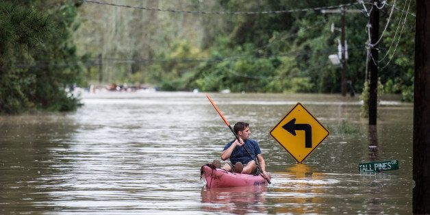 COLUMBIA, SC - OCTOBER 4: A man kayaks on Tall Pines Circle October 4, 2015 in Columbia, South Carolina. South Carolina experiencied a record rainfall, with at leasrt 11.5 inches falling October 3. (Photo by Sean Rayford/Getty Images)