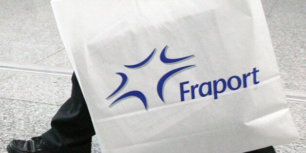 GERMANY - MAY 31: The logo for Frankfurt International Airport, or Fraport, is seen on a carry bag inside the airport in Frankfurt, Germany, Wednesday, May 31, 2006. Fraport AG, owner of Frankfurt Airport, said it might have to reduce takeoff and landing fees this year in response to demands from airlines to cut costs because of rising fuel prices. (Photo by Alex Kraus/Bloomberg via Getty Images)