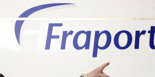 FRANKFURT/MAIN, GERMANY: Fraport chairman Wilhelm Bender poses in front of his company's logo prior to give a press conference, 07 March 2006 in Frankfurt/M. Fraport, operator of the Europe's second-busiest airport in Frankfurt, presented its annual report. AFP PHOTO DDP/THOMAS LOHNES GERMANY OUT (Photo credit should read THOMAS LOHNES/AFP/Getty Images)