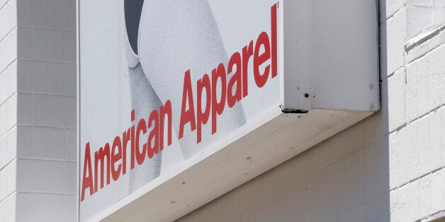 This July 9, 2015 photo shows signage at the American Apparel store in the Shadyside neighborhood of Pittsburgh. (AP Photo/Keith Srakocic)