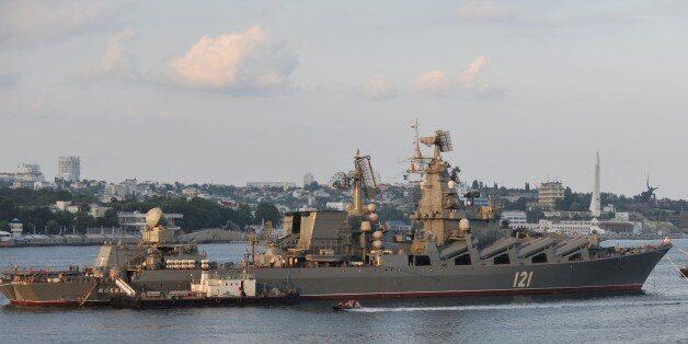 A picture taken on July 31, 2011 shows the Moskva guided missile cruiser participating in a Russian military Navy Day parade near an important navy base in the Ukrainian town of Sevastopol. Russia's defence ministry on September 24, 2015 said it will hold naval drills in the 'east Mediterranean' in September and October, as the West frets over a military buildup by Moscow in Syria. The exercises include three warships from Russia's Black Sea Fleet, including the Saratov landing ship, the Moskva guided missile cruiser and the Smetlivy destroyer, the ministry said in a statement. AFP PHOTO / VASILY MAXIMOV (Photo credit should read VASILY MAXIMOV/AFP/Getty Images)