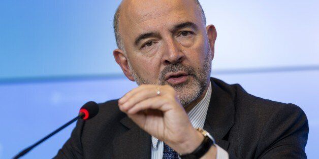 EU Economic and Financial Affairs, Taxation and Customs Commissioner Pierre Moscovici gestures as he talks during a press conference as part of an informal economic and financial affairs council (ECOFIN) at the European Council in Luxembourg on September 11, 2015. AFP PHOTO / THIERRY MONASSE (Photo credit should read THIERRY MONASSE/AFP/Getty Images)