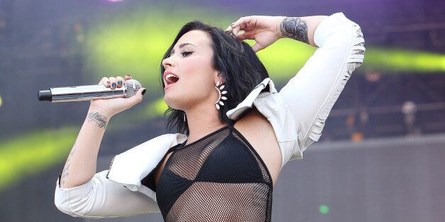 LAS VEGAS, NV - SEPTEMBER 19: Demi Lovato performs onstage during the 2015 iHeartRadio Music Festival - Daytime Village held at the MGM Festival Grounds on September 19, 2015 in Las Vegas, Nevada. (Photo by Michael Tran/WireImage)