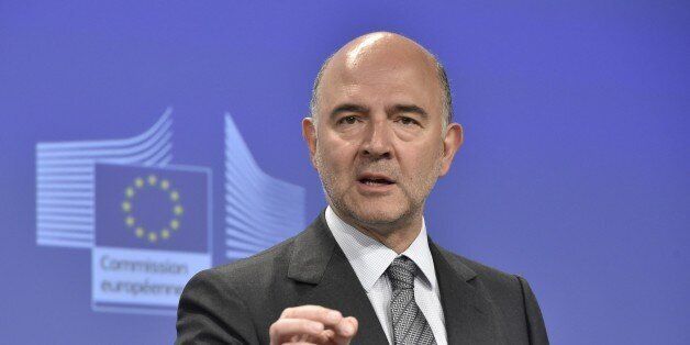 Pierre Moscovici, EU commissioner of Economic and Financial Affairs, Taxation and Customs, holds a press conference at the EU headquarters in Brussels on July 22, 2015. AFP PHOTO/ JOHN THYS (Photo credit should read JOHN THYS/AFP/Getty Images)