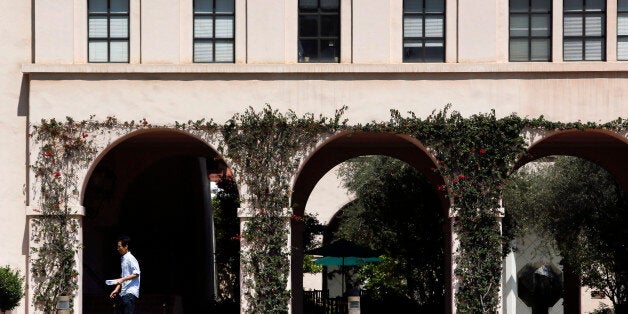 A man walks on the California Institute of Technology (Caltech) campus in Pasadena, California, U.S., on Tuesday, July 9, 2013. The California Institute of Technology, a private research university with strong emphases on science and engineering, has produced 31 alumni and faculty to have won a total of 32 Nobel Prizes. Photographer: Patrick T. Fallon/Bloomberg via Getty Images