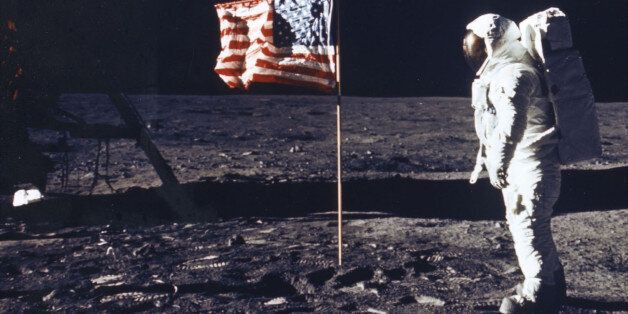 Astronaut Edwin E. Aldrin Jr. Poses For A Photograph Beside The Deployed Flag Of The United States. The Lunar Module Is On The Left. Man's First Landing On The Moon Occurred Today At 4:17 P.M. July 20, 1969 As Lunar Module 'Eagle' Touched Down Gently On The Sea Of Tranquility On The East Side Of The Moon. The Lm (Lunar Module) Landed On The Moon On July 20, 1969 And Returned To The Command Module On July 21. The Command Module Left Lunar Orbit On July 22 And Returned To Earth On July 24, 1969. Apollo 11 Splashed Down In The Pacific Ocean On 24 July 1969 At 12:50:35 P.M. Edt After A Mission Elapsed Time Of 195 Hrs, 18 Mins, 35 Secs. (Photo By Nasa/Getty Images)
