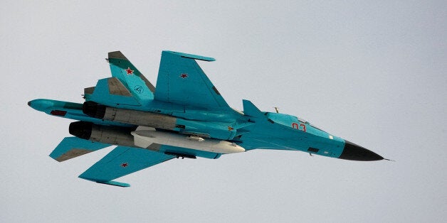 A Su-34 war plane with Russian President Dmitry Medvedev aboard, for a familiarization flight from the Kubinka airfield near Moscow in Kubinka, Russia, Saturday, March 28, 2009.(AP Photo/Alexander Zemlianichenko, Pool)