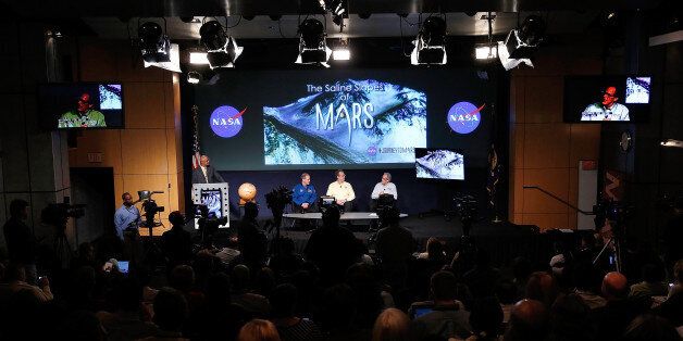 WASHINGTON, DC - SEPTEMBER 28: (L to R) John Grunsfeld, associate administrator at NASA's Science Mission Directorate, Jim Green, director of planetary science at NASA Headquarters and Michael Meyer, lead scientist for the Mars Exploration Program at NASA Headquarters, answer questions during a press conference where NASA announced new findings that provide the 'strongest evidence yet' of salty liquid water currently existing on Mars on September 28, 2015 in Washington, DC. 'Our quest on Mars has been to follow the water in our search for life in the universe, and now we have convincing science that validates what we've long suspected,' said Grunsfeld. (Photo by Win McNamee/Getty Images)