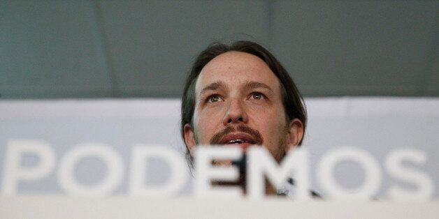 Pablo Iglesias, leader of the Podemos (We Can) party gives a speech to celebrate the party results after the elections and in support of local candidate for Ahora Madrid (Madrid Now) party in Madrid, Spain, Sunday, May 24, 2015. Ahora Madrid stood for the Madrid municipal elections to seek an end nearly four decades of dominance by the conservative Popular Party and the center-left Socialists.(AP Photo/Daniel Ochoa de Olza)