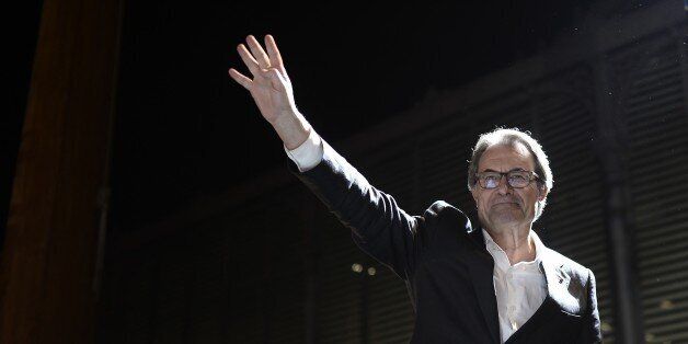 BARCELONA, SPAIN - SEPTEMBER 27: President of Catalonia Artur Mas waves to people after the Catalanist coalition 'Junts pel Si' (Together for the Yes) won the regional elections held, at the El Born Culture Center in Catalonia on September 27, 2015 in Barcelona, Spain. The main Catalanist parties, Catalan Democratic Convergence 'Convergencia Democratica de Catalunya' party (CDC), Republican Leftist of Catalonia 'Esquerra Republicana de Catalunya' party (ERC) and a group of social associations have joined together to form a Catalan pro-independence coalition 'Junts pel Si' (Together for the Yes). (Photo by Burak Akbulut/Anadolu Agency/Getty Images)
