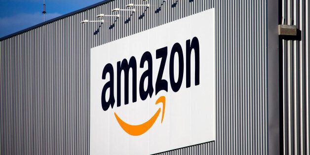 The Amazon logo is seen on the new logistics center of online merchant Amazon in Lauwin-Planque, northern France, Thursday, Sept. 19, 2013. Amazon France plans to create 2500 jobs by 2015 in this center. (AP Photo/Michel Spingler)