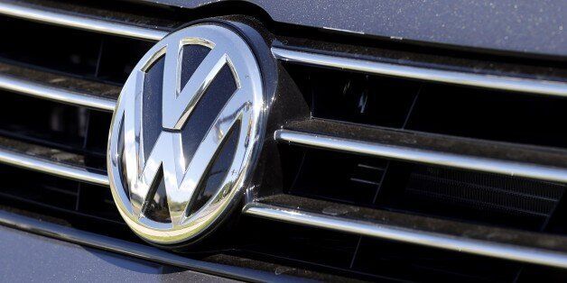 The grille of a Volkswagen car for sale is decorated with the iconic company symbol at a VW dealership in Boulder, Colo., Thursday, Sept. 24, 2015. Volkswagen is reeling days after it became public that the German company, which is the world's top-selling carmaker, had rigged diesel emissions to pass U.S. tests. (AP Photo/Brennan Linsley)