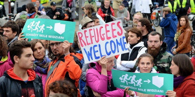 GDANSK, POLAND - SEPTEMBER 12(SOUTH AFRICA OUT): Members of Amnesty International demonstrate to support the implementation of the welcome policy towards foreign migrants from Syria and Iraq on September 12, 2015 in Gdansk, Poland. (Photo by Darek Majewski/Getty Images Poland/Getty Images)