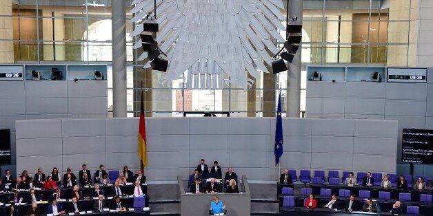 German chancellor Angela Merkel speeks at the Bundestag, Germany's lower house of parliament in Berlin on September 9, 2015. MP's engage the government in a debate discussing the budget of the German chancellery and other topics. AFP PHOTO / JOHN MACDOUGALL (Photo credit should read JOHN MACDOUGALL/AFP/Getty Images)