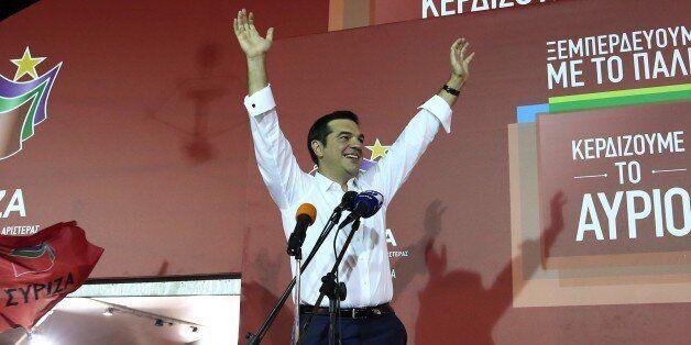 ATHENS, GREECE - SEPTEMBER 20: Alexis Tsipras speaks to crowd in Athens, Greece, on September 20, 2015. With nearly two-thirds of votes counted, Alexis Tsipras Syriza party seems highly likely to have won Greeces early general election. (Photo by Ayhan Mehmet/Anadolu Agency/Getty Images)