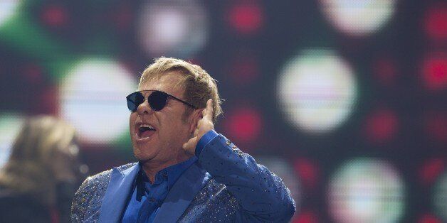 The British singer Sir Elton John performs at the Rock in Rio music festival in Rio de Janeiro, Brazil, Sunday, Sept. 20, 2015. (AP Photo/Leo Correa)