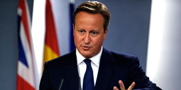 Britain's Prime Minister David Cameron talks to journalists during a joint news conference with his Spanish counterpart Mariano Rajoy after their meeting at the Moncloa Palace in Madrid, Spain, Friday, Sept. 4, 2015. Cameron was on Spain for an official visit after meeting his Portuguese counterpart Pedro Passos Coelho in Lisbon on Friday morning. (AP Photo/Francisco Seco)