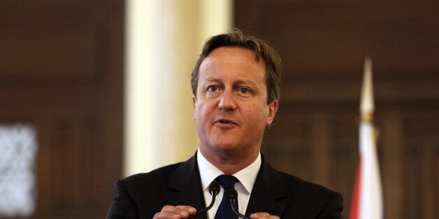 British Prime Minister David Cameron, speaks during a press conference with his Lebanese counterpart Tammam Salam at the Government House in Beirut, Lebanon, Monday, Sept. 14, 2015. Cameron met Monday in Lebanon with Syrian refugees who will resettle in Britain and vowed to continue his countryâs support to Lebanese troops fighting extremists of the Islamic State group. (AP Photo/Bilal Hussein)