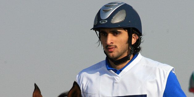 Equestrian Endurance individual raid gold winner Sheikh Rashid Bin Mohammed Al-Maktoum, son of Dubai ruler Sheikh Mohammed Rashid Al-Maktoum, competes during the race at the 15th Asian Games,14 December 2006 in Doha. Fifty-one riders headed out in a mass start at dawn's light for the 120km race over sand. AFP PHOTO/KHALED DESOUKI (Photo credit should read KHALED DESOUKI/AFP/Getty Images)
