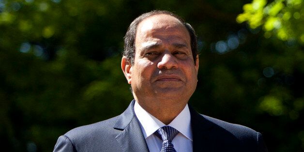 President of the Republic from Egypt, Abdel Fattah Al Sisi poses for the media during his meeting with the King Felipe VI of Spain at Zarzuela Palace in Madrid, Spain on Thursday, April 30, 2015. (AP Photo/Abraham Caro Marin)