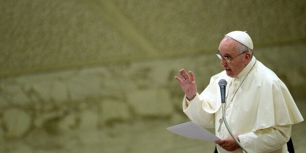 Pope Francis delivers a speach during an audience with parish cells for the evangelization in Paul VI hall at the Vatican on September 5, 2015. AFP PHOTO / FILIPPO MONTEFORTE (Photo credit should read FILIPPO MONTEFORTE/AFP/Getty Images)