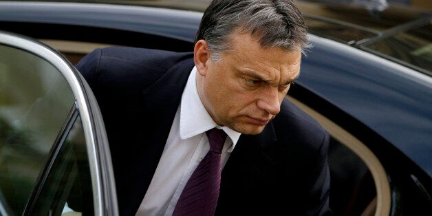 Hungarian Prime Minister Victor Orban arrives at the Presidential palace for a meeting with Cypriot President Dimitris Christofias, unseen, in the divided capital Nicosia, Cyprus, Monday, Dec. 13, 2010. Orban is in Cyprus for one-day official visit. (AP Photo/Petros Karadjias)