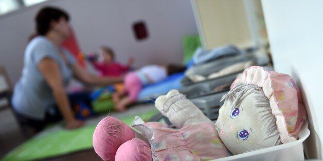 A cuddly baby doll is pictured at the childcare center of the Hopital Necker - Enfants Malades AP-HP (Welfare Services - Paris Hospitals) hospital on July 30, 2015 in Paris. The childcare center accepts children from the neighbourhood but was more particularly set up to allow siblings of hospitalized kids to meet. AFP PHOTO / LOIC VENANCE (Photo credit should read LOIC VENANCE/AFP/Getty Images)