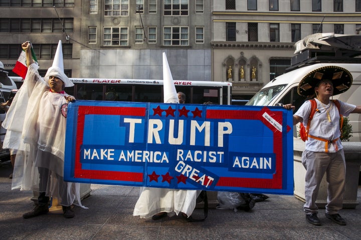 Demonstrators protest Donald Trump's candidacy for president outside Trump Tower in September 2015. 