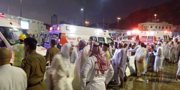 MECCA, SAUDI ARABIA - SEPTEMBER 11: At least 52 worshippers are killed and others injured when storms caused a crane to fall in Mecca's Grand Mosque on Friday, September 11, 2015. Millions of Muslim converge on Mecca to perform the sacred pilgrimage. A huge construction crane buffeted by strong winds collapsed and crashed through the roof of the Grand Mosque in Mecca Friday, the Saudi Arabia Civil Defense reports. Search and rescue teams and medical workers from the Saudi Red Crescent have been sent to the scene. (Photo by Ozkan Bilgin/Anadolu Agency/Getty Images)