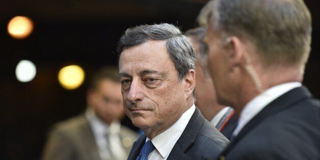 European Central Bank President Mario Draghi leaves a Eurogroup Summit meeting on June 22, 2015 at EU headquarters in Brussels. AFP PHOTO/JOHN THYS (Photo credit should read JOHN THYS/AFP/Getty Images)