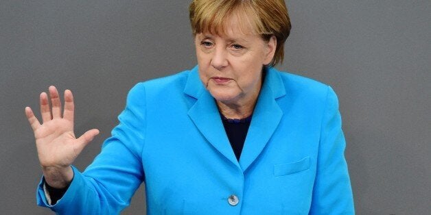 German Chancellor Angela Merkel speeks at the Bundestag, Germany's lower house of parliament in Berlin on September 9, 2015. The parlamentarians in a general debate discuss among others the budget of the German chancellery. AFP PHOTO / JOHN MACDOUGALL (Photo credit should read JOHN MACDOUGALL/AFP/Getty Images)