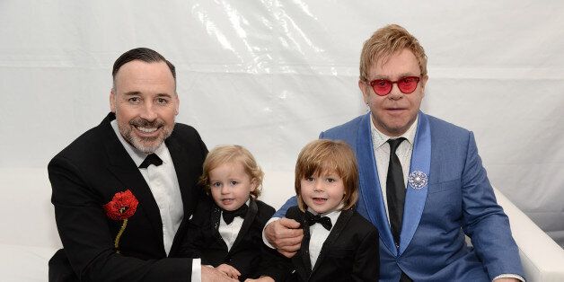 LOS ANGELES, CA - FEBRUARY 22: (L-R) David Furnish, Elijah Furnish-John, Zachary Furnish-John, and Sir Elton John attend the 23rd Annual Elton John AIDS Foundation Academy Awards Viewing Party on February 22, 2015 in Los Angeles, California. (Photo by Michael Kovac/Getty Images for EJAF)