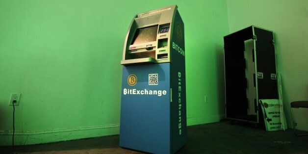 A Bitcoin ATM is shown at the Bitcoin Center, Monday, July 13, 2015 in New York. (AP Photo/Mark Lennihan)