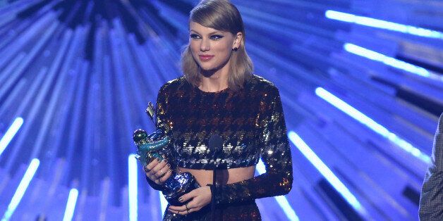 Taylor Swift accepts the award for female video of the year for