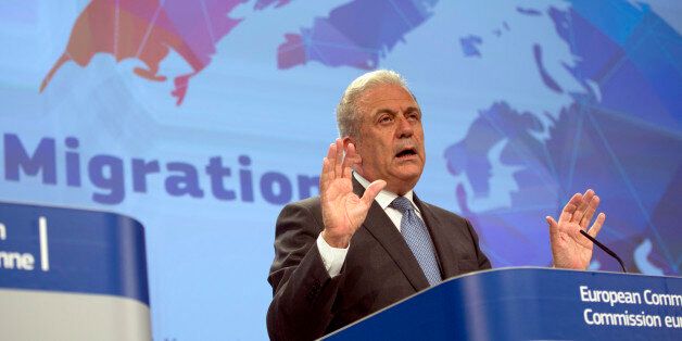 European Commissioner for Migration and Home Affairs Dimitris Avramopoulos speaks during a media conference at EU headquarters in Brussels on Wednesday, May 27, 2015. The EU moved Wednesday to help Italy and Greece manage a massive influx of migrants across the Mediterranean and oblige reluctant EU partners to share the refugee burden. (AP Photo/Virginia Mayo)