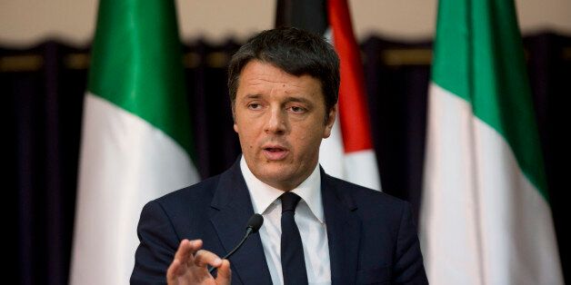 Italy's Prime Minister Matteo Renzi speaks during a press conference with Palestinian President Mahmoud Abbas at the Palestinian Authority headquarters in the West Bank city of Bethlehem on Wednesday, July 22, 2015. (AP Photo/Majdi Mohammed)