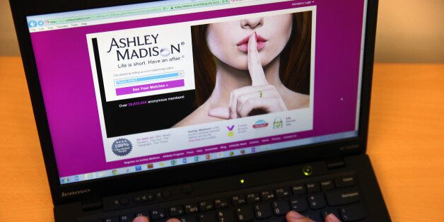 LONDON, ENGLAND - AUGUST 19: In this photo illustration, a man visits the Ashley Madison website on August 19, 2015 in London, England. Hackers who stole customer information from the cheating site AshleyMadison.com dumped 9.7 gigabytes of data to the dark web on Tuesday fulfilling a threat to release sensitive information including account details, log-ins and credit card details, if Avid Life Media, the owner of the website didn't take Ashley Madison.com offline permanently. (Photo illustrati