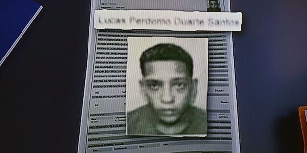 Screenshot from TV of a photo issued by Brazilian police of 20-year-old Lucas Perdomo Duarte Santos, one of 33 men suspected of gang-raping a 16-year-old girl in Rio de Janeiro on May 27, 2016.The suspects caused an uproar in Brazil when they posted a video of the assault on social media. / AFP / VANDERLEI ALMEIDA (Photo credit should read VANDERLEI ALMEIDA/AFP/Getty Images)