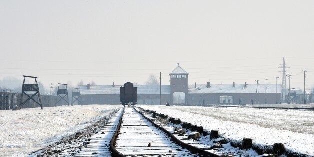 View of the rail way tracks at the former Nazi concentration camp Auschwitz-Birkenau in Oswiecim, Poland, on Holocaust Day, January 27, 2014. The ceremony took place 69 years after the liberation of the death camp by Soviet troops, in rememberance of the victims of the Holocaust. AFP PHOTO/JANEK SKARZYNSKI (Photo credit should read JANEK SKARZYNSKI/AFP/Getty Images)